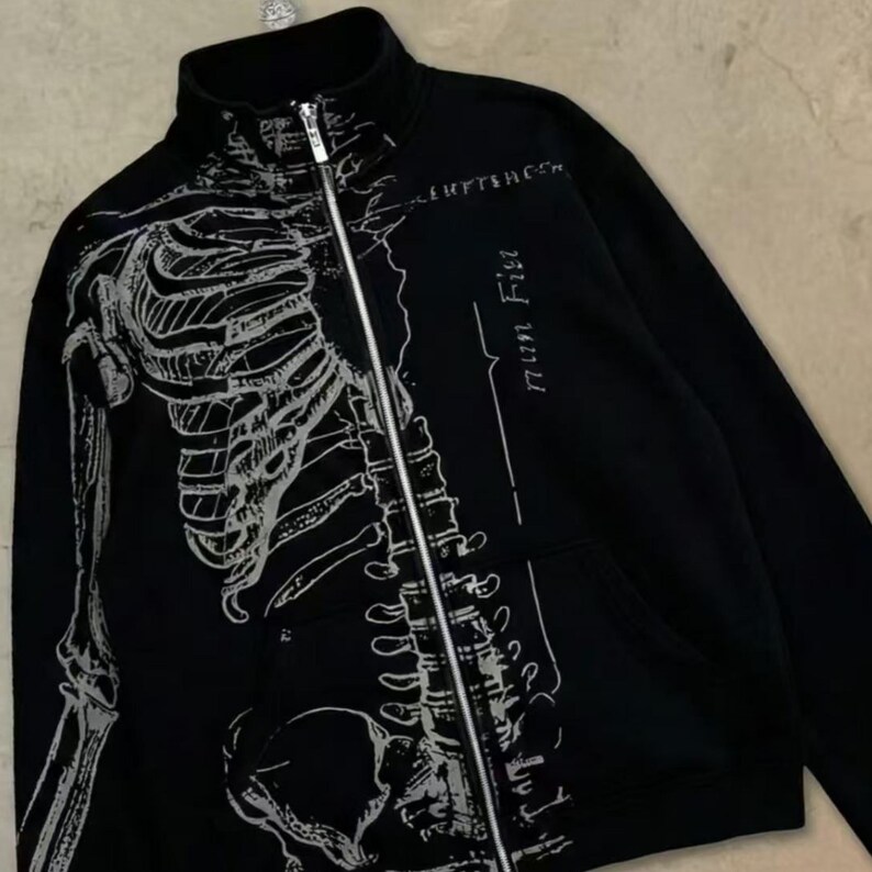 Zip Up Jacket | Gothic High Neck Sweater | Daily Wear | Y2K Streetwear Style

Zip up jacket with skeleton graphic print, gothic high neck design, and Y2K streetwear aesthetic.