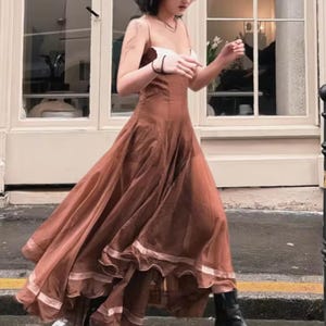 Beach Party Dress | Sleeveless Pleated Long Gown | Summer Wear | Romantic Beach Style

Beach party dress with sleeveless pleated gown shape, flowing long hem, and romantic summer styling.