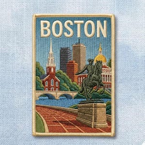 May include: A rectangular embroidered patch featuring the word BOSTON in large cream letters at the top. The design depicts a city skyline with a red brick church, a stone bridge, a golden-domed building, and a statue of a person on a horse.