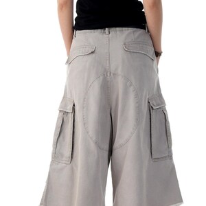 Pleated Denim Jorts | Vintage Wide Leg Shorts | Daily Wear | Retro Y2K Streetwear

Pleated denim jorts for men with a vintage washed finish and loose wide leg fit, styled for Y2K streetwear and casual summer outfits.