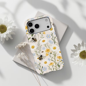 May include: A set of three ceramic mugs with a speckled, matte finish. The mugs are in shades of cream, light gray, and dark gray. Each mug has a simple, minimalist design and a rounded handle.