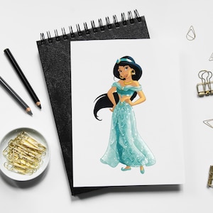 May include: A print of a cartoon character in a teal dress with gold jewelry and a blue headband. The character has long black hair and is standing on a white background. The print is on a white paper, resting on a black notebook.