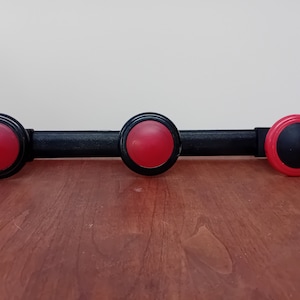 Red and Black Plastic Coat Hooks