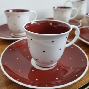 Susie Cooper Cups and Saucers, White and Maroon Polka Dot Susie Cooper Espresso Cups and Saucers, Milk Jug and Sugar Bowl