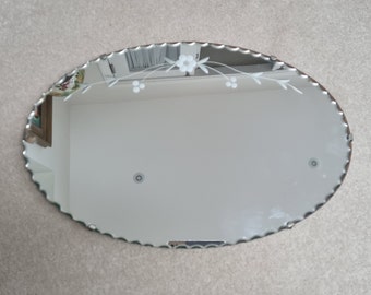 Scalloped Bevelled Edge Mirror with Floral Motif