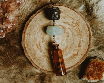 Buddha + Feather in a Bottle Necklace