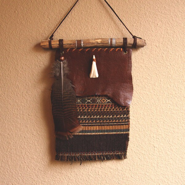 aurora.  a buffalo and turkey inspired bohemian wall hanging.