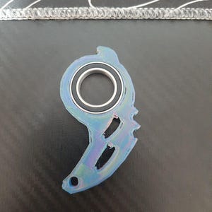 Keyrambit/key spinner fidget toy