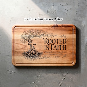 May include: A rectangular wooden chopping board featuring a laser-engraved design of a tree with roots forming a cross. The text reads "ROOTED IN FAITH" and "Blessed is the one who trusts in the Lord, whose confidence is in Him." The top text says 9 Christian Laser Files.