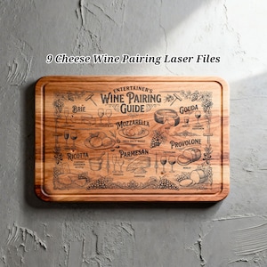 May include: A rectangular wooden cutting board with a dark border. The board features an engraved "Entertainer's Wine Pairing Guide" with cheese and wine pairings. The text "9 Cheese Wine Pairing Laser Files" is at the top.