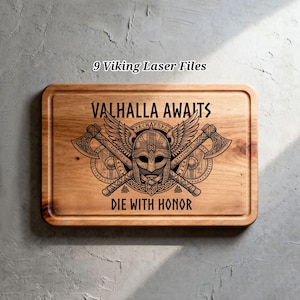 May include: A rectangular wooden cutting board with a carved Viking design. The design includes a helmet, axes, and the text "VALHALLA AWAITS" and "DIE WITH HONOR". The words "9 Viking Laser Files" are above the board.