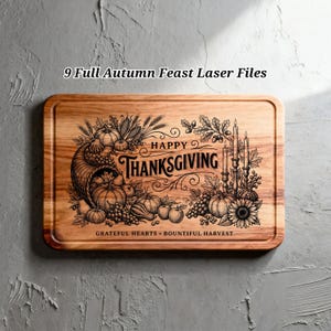 May include: A rectangular wooden cutting board featuring a laser-engraved design with the text 9 Full Autumn Feast Laser Files, HAPPY THANKSGIVING, and GRATEFUL HEARTS BOUNTIFUL HARVEST, surrounded by illustrations of pumpkins, corn, and candles.