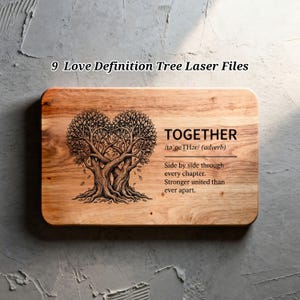 May include: A rectangular wooden cutting board with rounded corners. The board features a laser-etched design of two trees forming a heart shape. The word "TOGETHER" and definition are etched on the right side. Text reads "Side by side through every chapter. Stronger united than ever apart."