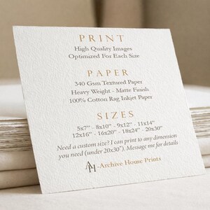 May include: A white textured card with printed text detailing print quality, 340 gsm matte paper, and available sizes in inches from 5x7 to 20x30. The card includes the text Archive House Prints and offers custom sizing under 20x30 inches.