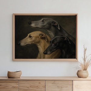 May include: A framed artwork featuring three greyhounds in profile. The dogs are depicted in shades of grey, tan, and black against a dark background. The artwork is displayed above a wooden cabinet, adding a touch of elegance to the room.