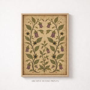 May include: A rectangular wall art print featuring a symmetrical botanical illustration of purple bell-shaped flowers and green leaves on a textured beige background, enclosed in a light wood frame with the text Archive House Prints below.