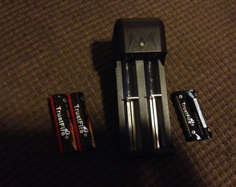 2 lithium batteries AND charger