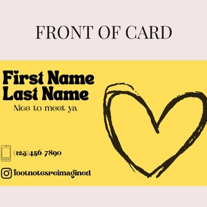 May include: A yellow business card with black text and a black heart graphic. The card reads "First Name Last Name" and "Nice to meet ya." A phone icon and phone number are also included, along with an Instagram handle.