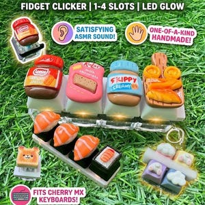 May include: Artisan keycaps with a variety of designs, including food-themed and abstract styles. The keycaps feature a fidget clicker, LED glow, and are handmade. The image includes keycaps shaped like a jar of spread, a candy bar, sushi, and a bear.