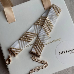 May include: A rustic wooden sign with the text "Welcome to our porch" in white lettering. The sign features a distressed finish and a simple, inviting design, perfect for outdoor decor.