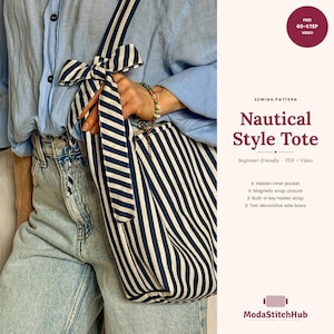 May include: A navy and white striped tote bag with a bow detail on the strap. The bag is held by a person wearing a light blue shirt and jeans. The text on the image reads "Nautical Style Tote".