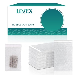 May include: White bubble out bags with a stack of bubble wrap and a box with the text "LEVEX BUBBLE OUT BAGS". The bags are designed for protecting items during shipping.
