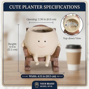 A whimsical cream-colored round face planter with a simple painted smile, sitting relaxed in a miniature brown wooden rocking chair. The cute character pot has small legs dangling down and is holding a vibrant pink and green fittonia nerve plant on a rustic wooden table.