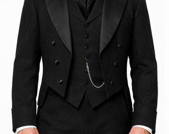 May include: A formal black tuxedo with a notched lapel, double-breasted jacket, and matching vest. The suit includes a white dress shirt, black tie, and a silver chain. The tailored suit is suitable for formal events and special occasions.