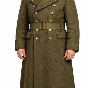 May include: Olive green military coat with a double-breasted design, gold buttons, and a matching belt. The coat features a high collar and is paired with a military cap. The coat's length extends to the mid-calf.