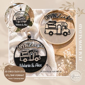 May include: Wooden camping-themed ornaments. One is black with a camper design and the text "Camping Liebe" and "Melanie & Alex." The other is a natural wood color with the same camper design and text. The ornaments are round and have a string for hanging.