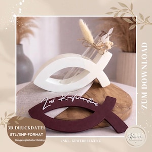 Könnte beinhalten: Eine weiße und weinrote Holzdekoration in Fischform mit dem Text "Zur Konfirmation". Der weiße Fisch hält ein Reagenzglas mit Trockenblumen. Das Bild enthält auch den Text "3D DRUCKDATEI STL/3MF-FORMAT Reagenzglashalter Rohling".