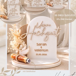 Może przedstawiać: Biały, łukowaty stojak ślubny z wypukłym napisem "Unsere Hochzeit", "Sarah & Valentin" oraz "21.05.2026". Stojak zawiera figurkę gołębicy, uchwyt na pieniądze oraz dekoracyjną kompozycję z suszonych kwiatów.