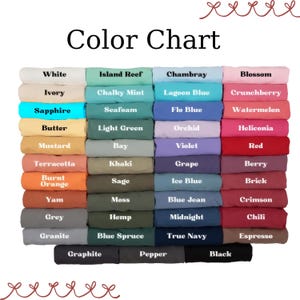 May include: A color chart displaying a grid of folded fabric swatches in various shades. Each swatch is labeled with its color name, including White, Ivory, Sapphire, Butter, Mustard, Terracotta, Burnt Orange, Yam, Grey, Granite, Graphite, Pepper, and Black.