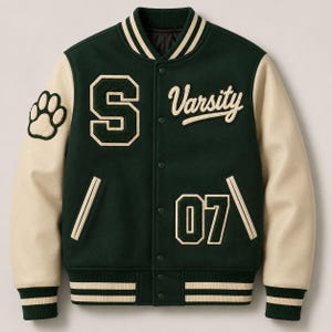 May include: A green varsity jacket with cream-colored sleeves. The jacket features the letter "S", the word "Varsity", the number "07", and a paw print patch. The collar, cuffs, and hem have cream and green stripes.
