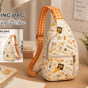 May include: A sling bag sewing pattern featuring a cream-colored bag with a multi-colored craft supply print and an orange and white gingham adjustable strap. The bag has a front zippered pocket and a main compartment with a silver zipper closure.