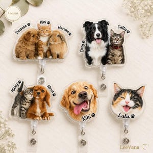 May include: Five custom acrylic badge reels featuring printed portraits of pets including dogs, cats, and a rabbit. Each reel displays pet names such as Daisuke, Kini, Haruko, Ozzy, Catty, Nicky, Nova, Kiki, and Lulu, accompanied by small paw print icons.