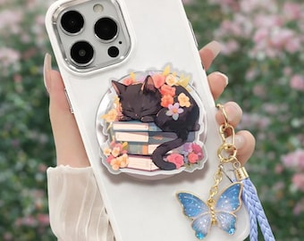 Black Cat Sleeping on Books Phone Grip, Spring Flowers Bookish Phone Stand (MagSafe)
