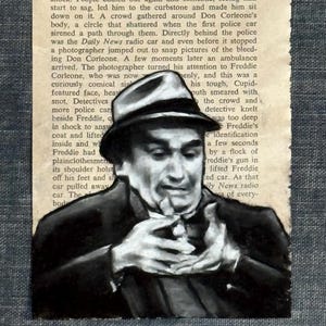May include: Mixed media artwork on a vintage book page. The artwork depicts a black and white portrait of a man in a fedora, reminiscent of a film noir character. The text from "The Godfather" is visible in the background.