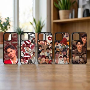 May include: Five black phone cases with different designs. One case features a collage of images and the text "I Love You". Another case has a collage of images and the text "Malachi Boston". Other cases have collages of images and the text "Malachi".