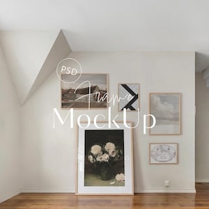May include: A wall with five framed art pieces. The art includes a landscape, abstract geometric design, and floral still life. The frames are light wood, and the wall is white. Text on the image reads "Frame MockUp".