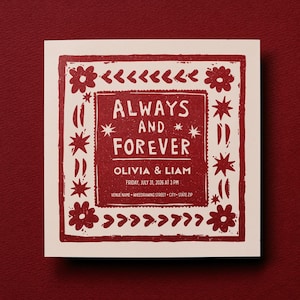 Op de afbeelding: Een vierkante uitnodiging met een rood ontwerp op een witte achtergrond. De tekst luidt "ALWAYS AND FOREVER" met de namen Olivia & Liam, datum en tijd. Bloemen- en pijlmotieven omlijsten de tekst.