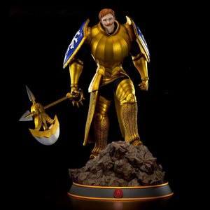 May include: A golden figurine of a character in full armor, holding a large axe. The armor has blue accents on the shoulders and is standing on a rocky base. The figure has red hair and a mustache. The base is black with a red emblem.