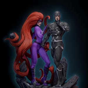 May include: A detailed statue of two comic book characters. One figure is in a purple bodysuit with long red hair, and the other is in a black suit with silver accents. They stand on a rocky base against a dark background.