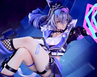 May include: A detailed figurine of a female anime character in a dynamic pose. She wears a futuristic outfit with shades of blue, white, and black, including a jacket, shorts, and fishnet stockings. The figure has silver hair and is holding a tablet-like device.