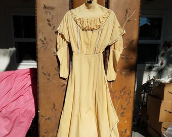 1920s pale yellow full length dress with ivory trim detail