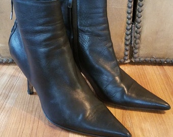 90s Dior black leather stiletto pointy ankle boots with lace bows at the back