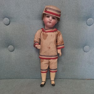 Antique 1900s rare Gebruder Kuhnlenz bisque head military costume little doll