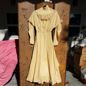 1920s pale yellow full length dress with ivory trim detail
