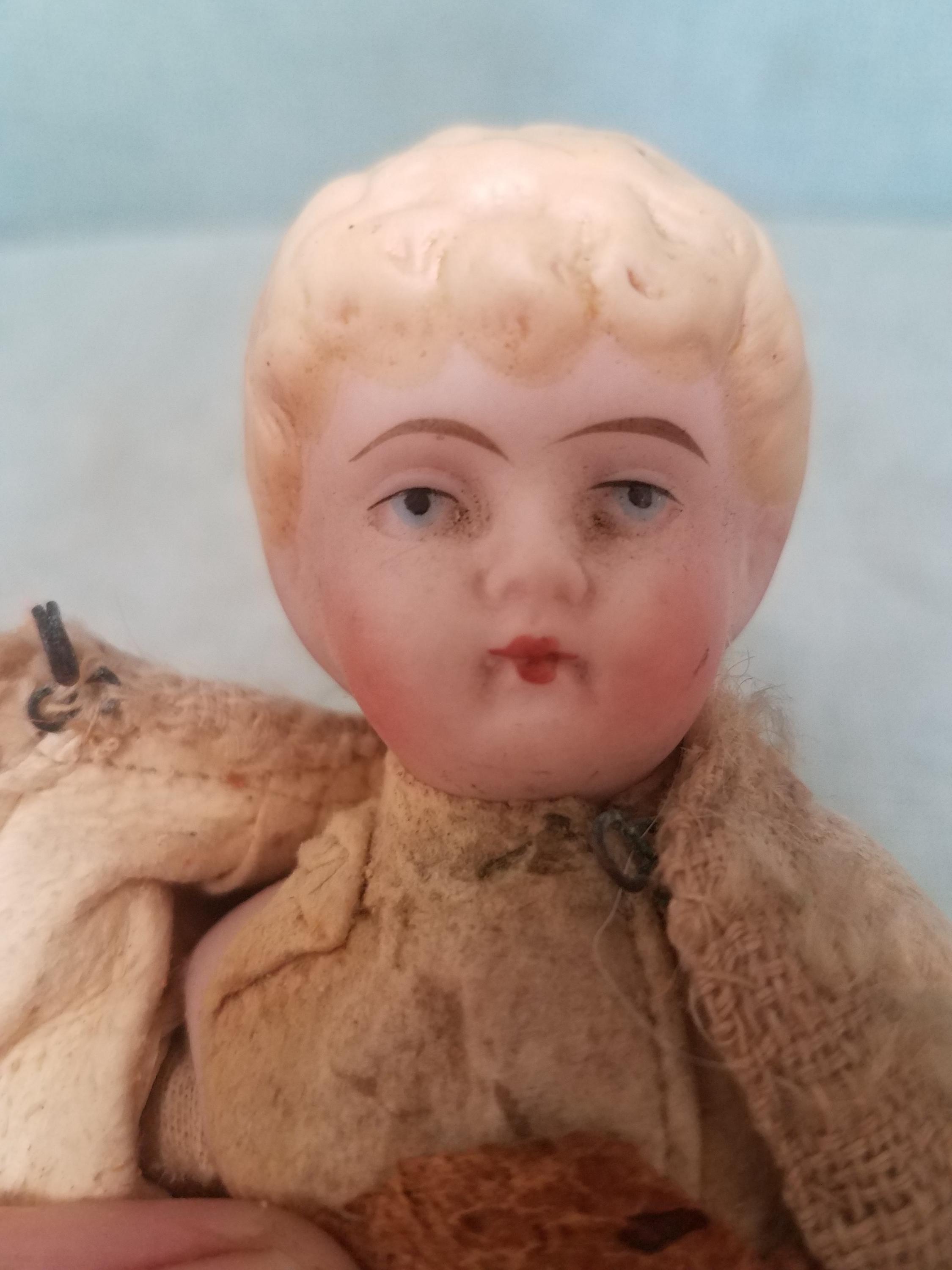 1890s Antique Blonde China Head Doll With Stuffed Body and Leather
