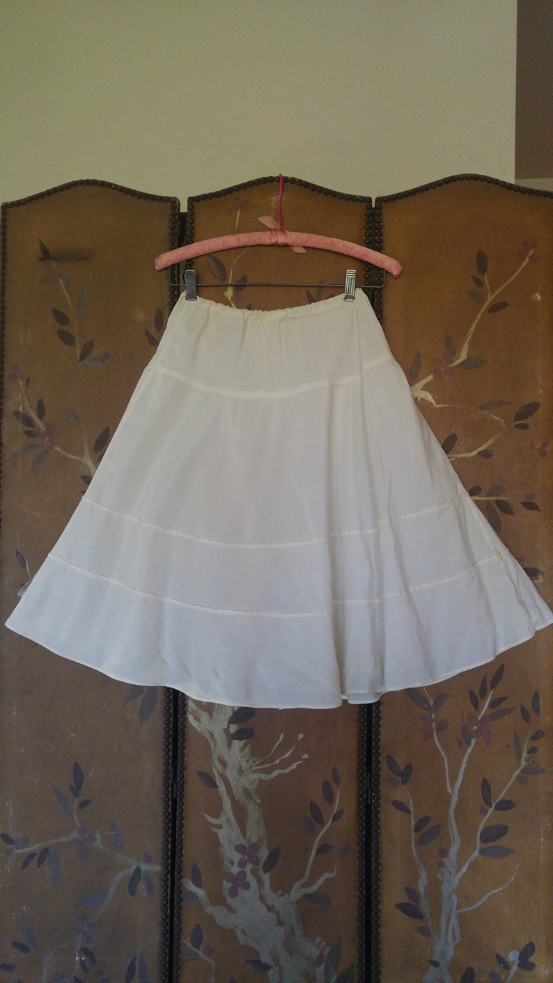 60/'s Ivory petticoat with frilly netting underneath